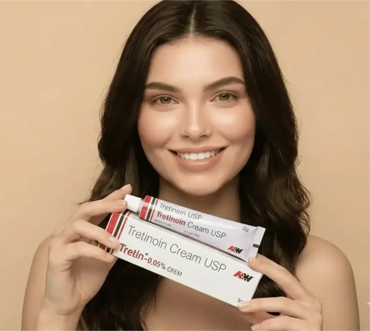 Model applying tretinoin cream